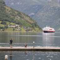 Ein Postschiff besucht den Geirangerfjord